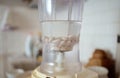 Blender and almonds soaked in water. Homemade healthy vegan milk Royalty Free Stock Photo