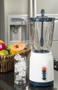 Blender and fruits and kitchen space