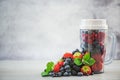 Blender full of berry fruits Royalty Free Stock Photo