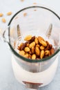 Blender with soaked almonds for making nut milk Royalty Free Stock Photo