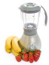 Blender with strawberries and bananas Royalty Free Stock Photo