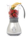 Blender with strawberries and bananas Royalty Free Stock Photo