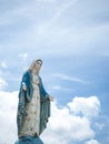 The Blessed Virgin Mary Statue blue sky background Royalty Free Stock Photo