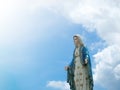 The Blessed Virgin Mary Statue blue sky background Royalty Free Stock Photo