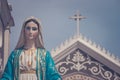 The Blessed Virgin Mary statue standing in front of The Cathedral of the Immaculate Conception. Royalty Free Stock Photo