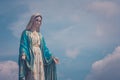 The Blessed Virgin Mary statue standing in front of The Cathedral of the Immaculate Conception at The Roman Catholic Diocese. Royalty Free Stock Photo