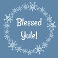 Blessed Yule lettering in winter snowflakes wreath