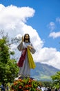 Blessing Jesus Christ in Cagsawa Ruins in front of Mayon Volcano, Cagsawa Ruins Park Royalty Free Stock Photo