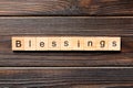 Blessings word written on wood block. Blessings text on wooden table for your desing, Top view concept Royalty Free Stock Photo