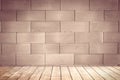 Blick brown wall background and wood shelf. Royalty Free Stock Photo