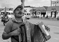 Blind Accordian Player Plays for Money