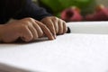 Blind children read text in braille