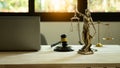 Blind justice symbol on a metal statue Stunning photograph with a statue of the goddess holding Themis` light brush, scales, and j Royalty Free Stock Photo