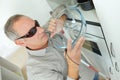 Blind man in kitchen Royalty Free Stock Photo