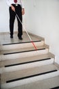 Blind Man Moving Down On Stairway