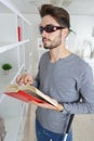 blind man reading braille book at home Royalty Free Stock Photo
