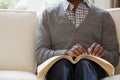 Blind man reading a braille book