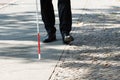 Blind Man With White Stick On Street