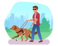 Blind person with guide dog and walking stick