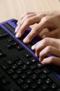 Blind person using computer with braille computer display Royalty Free Stock Photo