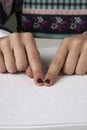 Blind reading text in braille language Royalty Free Stock Photo