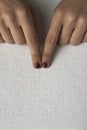 Blind reading text in braille language Royalty Free Stock Photo