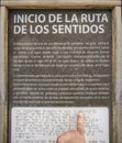 Blind reading text caption in braille at Senses route of Los Barruecos, Spain