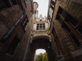 Panorama of blinde-Ezelstraat blind donkey street arch bridge narrow cobblestone alley in Bruges West Flanders Belgium Royalty Free Stock Photo