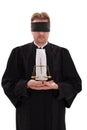 Blindfold lawyer with golden scale of justice
