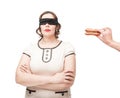 Blindfold plus size woman temptating with hamburger Royalty Free Stock Photo