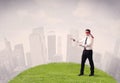 Blindfolded businessman with a cloudy city in the background Royalty Free Stock Photo