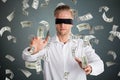 Blindfolded Businessman With Falling Money Royalty Free Stock Photo
