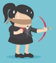 Blindfolded businesswomen are shooting arrows