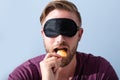 Blindfolded Man Testing Food Royalty Free Stock Photo