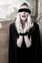 Blindfolded young woman Royalty Free Stock Photo