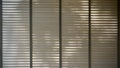 Blinds, Evening sun light outside window blinds, sunshine and shadow on window blind, decorative interior in home Royalty Free Stock Photo