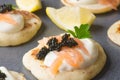 Blini with caviar and smoked salmon