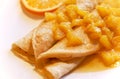 Blini with oranges in sweet sauce