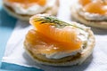 Blinis with white cheese and salmon