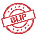 BLIP text written on red vintage stamp