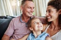 Blissful family days. a happy family relaxing together at home.