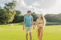 A blissful moment as a pregnant woman and her husband spend quality time together outdoors, savoring each other's Royalty Free Stock Photo