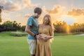 A blissful moment as a pregnant woman and her husband spend quality time together outdoors, savoring each other& x27;s Royalty Free Stock Photo