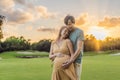 A blissful moment as a pregnant woman and her husband spend quality time together outdoors, savoring each other& x27;s Royalty Free Stock Photo
