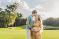 A blissful moment as a pregnant woman and her husband spend quality time together outdoors, savoring each other& x27;s Royalty Free Stock Photo