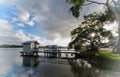 Blissful view of a small modern boatshed on background of the cloudy blue sky Royalty Free Stock Photo
