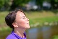 Blissful woman enjoying the spring sunshine Royalty Free Stock Photo