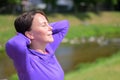 Blissful woman enjoying the spring sunshine