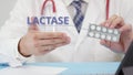 Medical doctor talks about Lactase tablets in his office. Telemedicine session with a patient