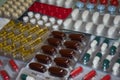 Blister packs full of multi-colored pills. Royalty Free Stock Photo